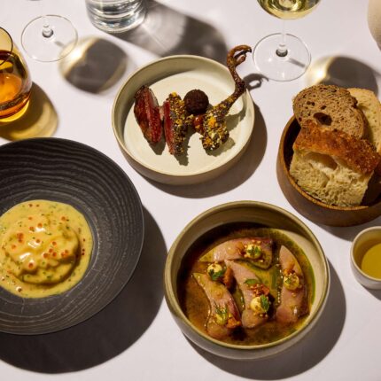 Artistically plated modern French appetizer course at Michelin-starred Galvin La Chapelle.