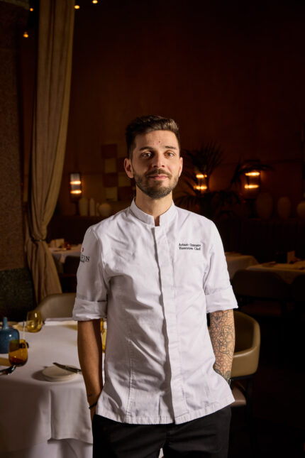 Portrait of chefs Arturo Granato and Tom Booton collaborating in the kitchen ahead of their exclusive tasting menu event.